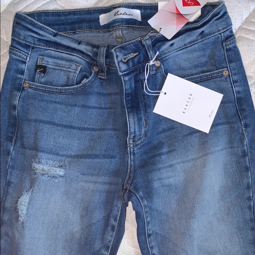 Ripped blue jeans - never worn still had tags